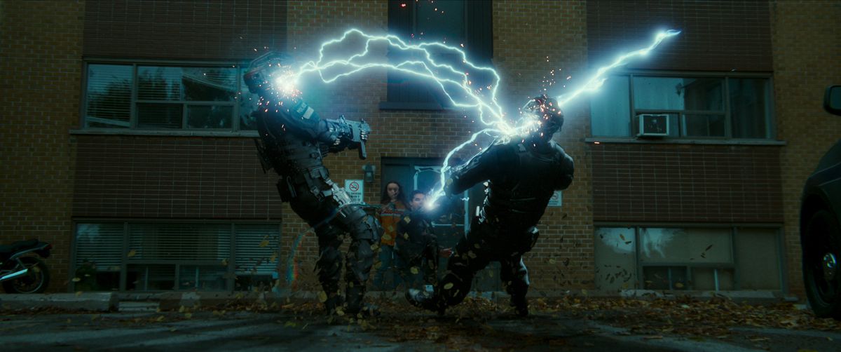 A man shoots lightning bolts from his hands and hits two uniformed officers, in Code 8 Part II