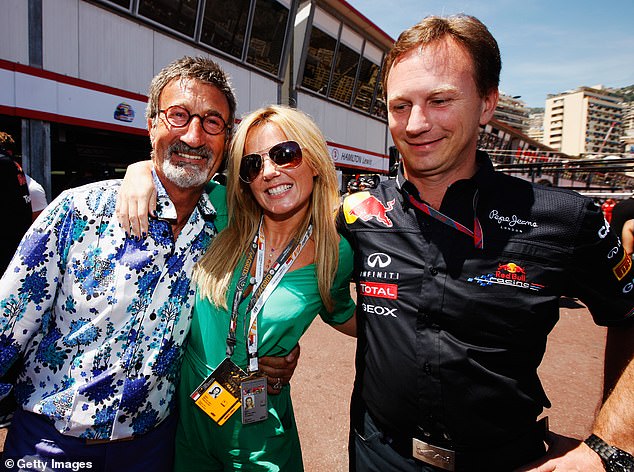 2011: Halliwell had one arm around flamboyant former team owner and commentator Eddie Jordan, while the other clasped the back of an apparently nervous Horner