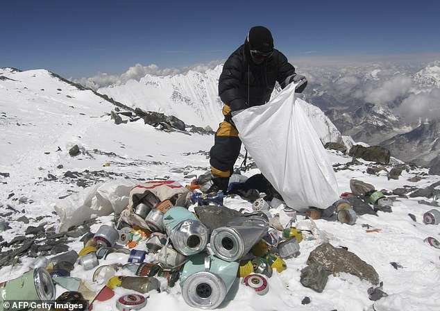 Waste collected from the mountain, as seen here during a 2010 cleanup at an altitude of almost 8,000 meters, is taken back down the mountain where it is recycled or dumped in landfills