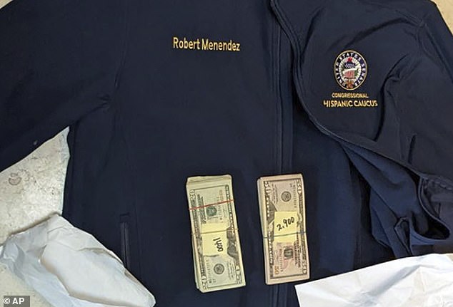 During a search, cash was found in jackets bearing the senator's name