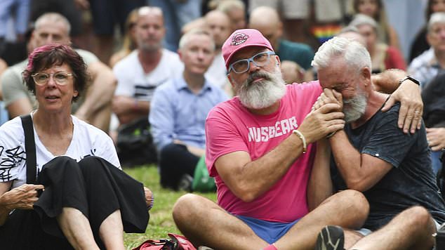 Hundreds of people gathered at Green Park in Darlinghurst on Friday evening, an evening that would normally mark the start of a weekend of parties and celebrations