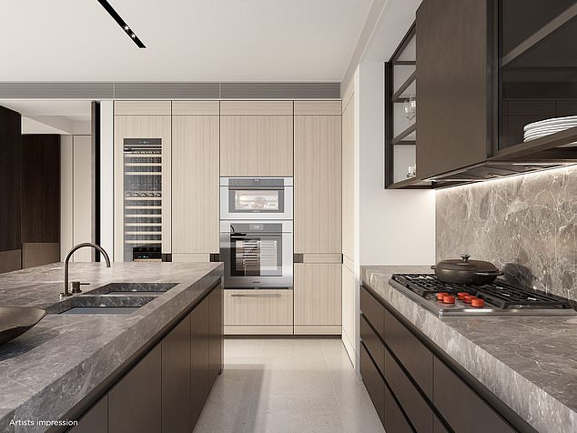 According to the report, most of the 24 apartments in the stylish block have already been sold.  Two of the penthouses – both with an estimated value of $50 million – have yet to go under the hammer.  In the photo: a kitchen in one of the great flats in the block