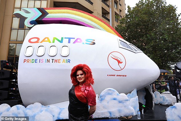 Luke Davies was honored on a float (pictured) by his former employer Qanats during the parade