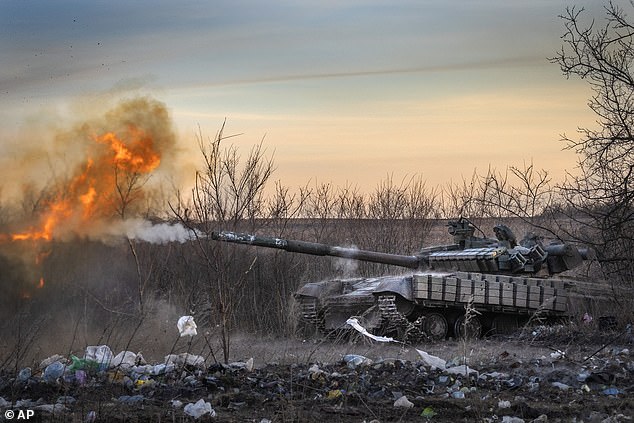 A Ukrainian tank from the 17th Tank Brigade fires on Russian positions in Khasiv Yar, the site of heavy fighting with Russian forces in the Donetsk region, on February 29