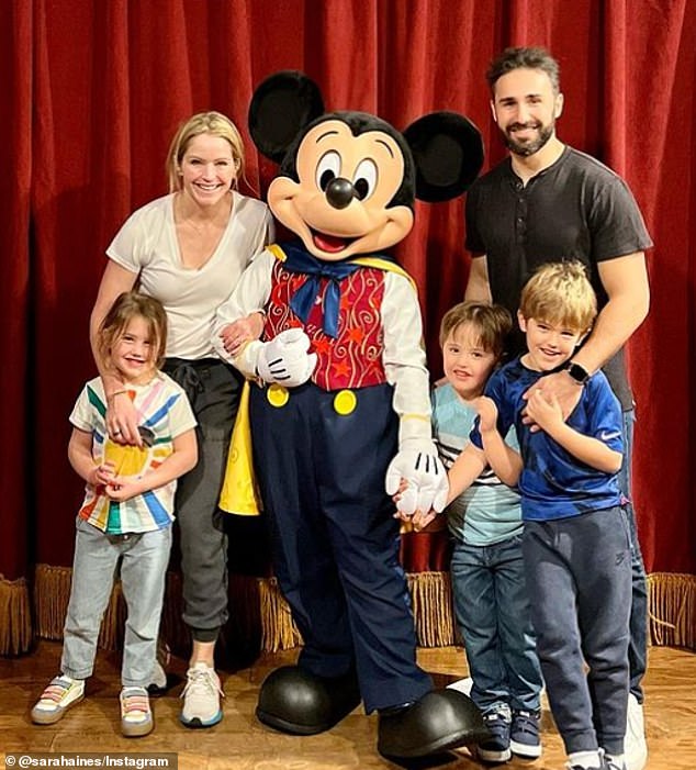 The TV host pictured with her husband Max Shifrin and their three children at Disneyland in November 2023