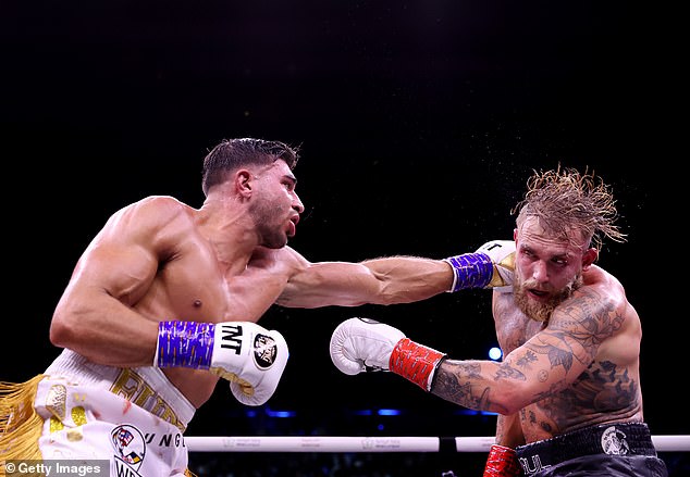 Paul (right) is determined to avenge his points defeat to fierce rival Tommy Fury (left).