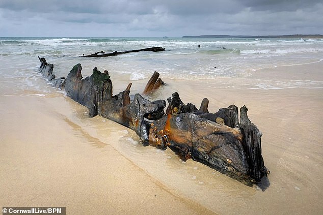 The wreck in Carbis Bay, near St Ives, has remained largely hidden under the sand this winter