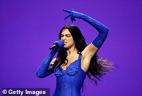 1709419062 644 BRIT Awards 2024 Charli XCX commands attention in trailing multi coloured