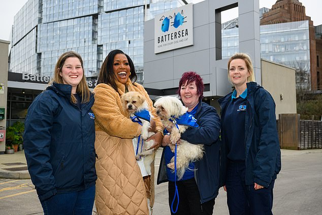 Alison Hammond with staff and dogs at Battersea Dogs & Cats Home.  Mrs Hammond has never owned a dog, and although she apparently loves meeting smaller breeds while filming for the program at London's Battersea Dogs & Cats Home, larger breeds would scare her.