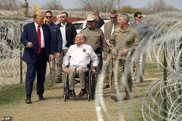 Republican presidential candidate, former President Donald Trump, talks with Texas Governor Greg Abbott on Thursday during a visit to the US-Mexico border in Eagle Pass, Texas