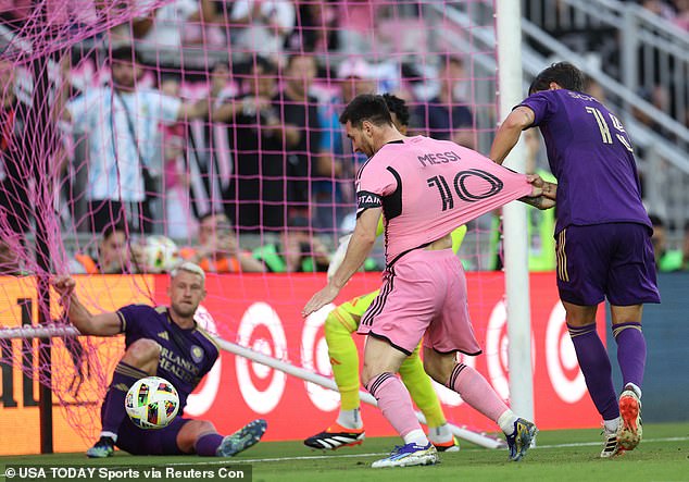 Messi simply tapped the shot in inches from the goal line after Suarez's shot was deflected