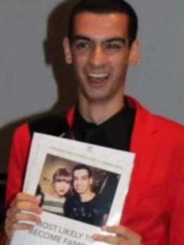 Lamarre-Condon is pictured holding his high school yearbook, which featured a photo of him with Taylor Swift and voted him 'Most Likely to Be Famous'