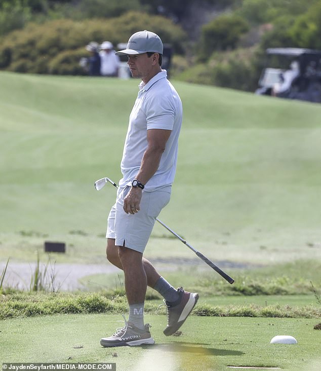 The Ted star added a gray cap with a Municipal logo on the front and wore a pair of golf gloves, as well as Municipal branded sneakers