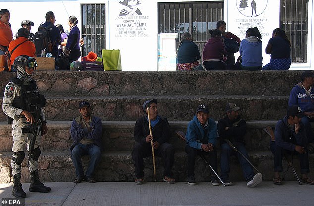 Members of Mexico's National Guard (GN) tour the community of Ayahualtempa, southern Guerrero state, Mexico, January 31