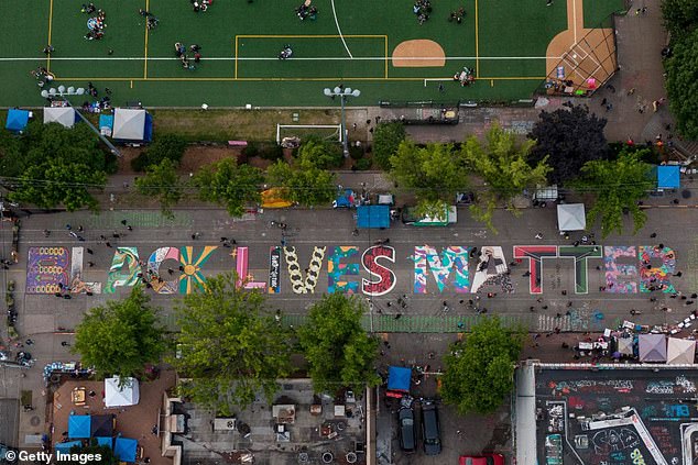 An aerial view of a Black Lives Matter mural in Seattle, in what was first called the Capitol Hill Autonomous Zone, which included several blocks around the Seattle Police Department's East Precinct