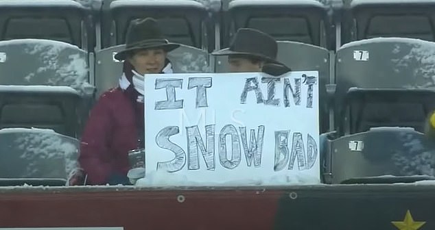 Some football fans are used to snowy conditions, like these spectators at the Young Matildas match in Uzbekistan