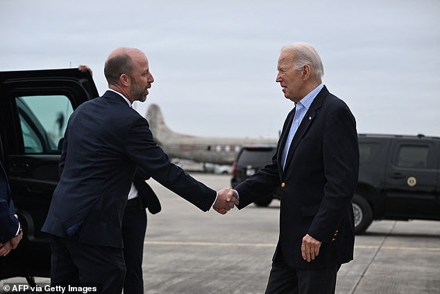 President Joe Biden greets Brownsville Mayor John Cowen on Thursday upon arrival in Brownsville, Texas, where he met with federal Border Patrol agents