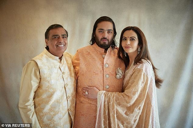 Mukesh Ambani, the chairman of Reliance Industries, his wife Nita Ambani and their son Anant Ambani