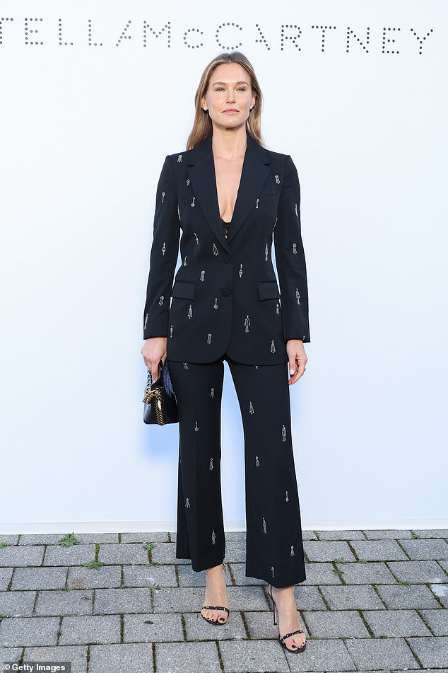 Elsewhere, Bar Refaeli looked fantastic wearing a plunging black blazer and wide leg trousers