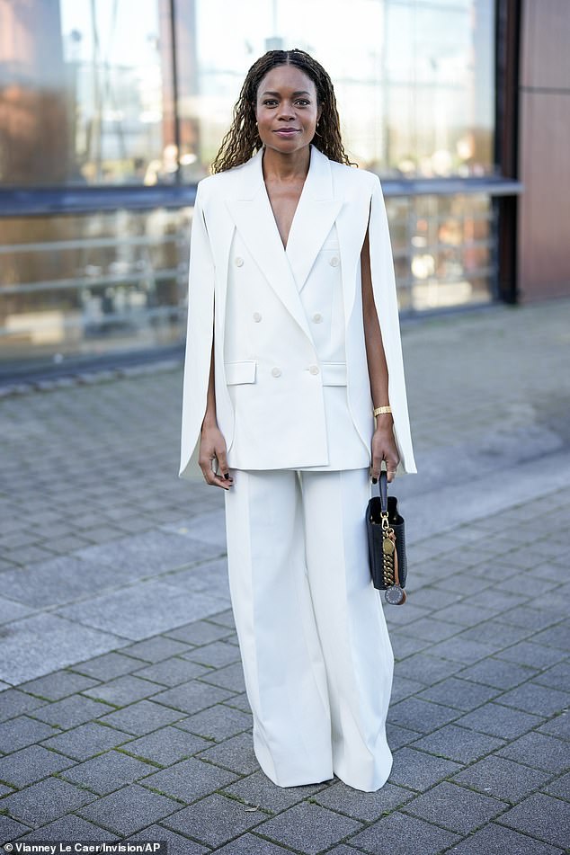 Actress Naomie Harris, 47, looked sophisticated in a white blazer and flared trousers as she arrived