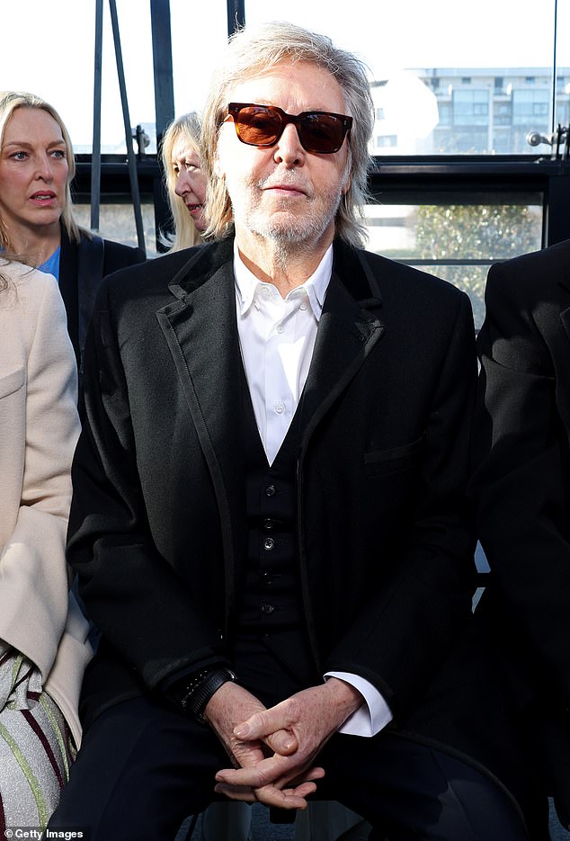 Stella's famous dad Paul McCartney was also at the FROW to support her and looked cool in a black suit and white shirt