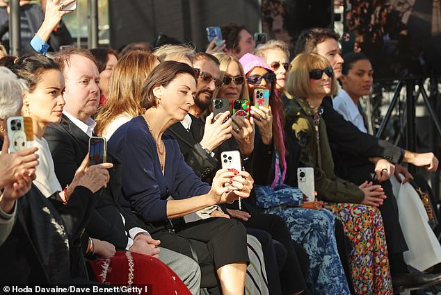 The group couldn't stop taking photos during the show, including photographer Mary