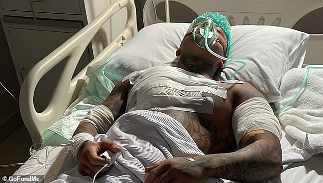 Mr Wilson is seen in hospital after being stabbed in Bali