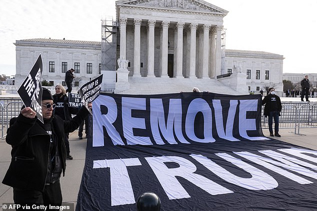 Anti-Trump demonstrators protest outside the US Supreme Court before the court ruled on former US President Donald Trump's eligibility to run for president in the 2024 election in Washington, DC, on February 8, 2024