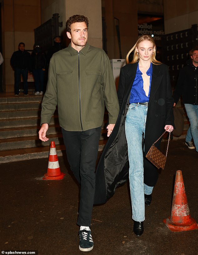 The actress appeared cheerful as she left the property developer's chic La Girafe restaurant in the French capital