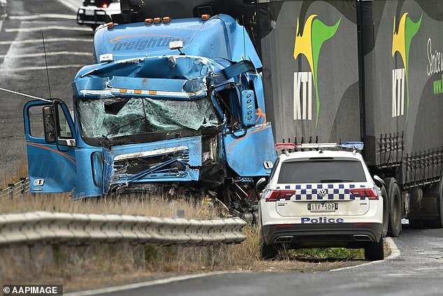 Truck driver Brett Russell was charged with 80 offences, including dangerous driving causing serious injury and reckless driving endangering life, after he allegedly rear-ended the Loreto College Ballarat bus (photo: the crashed truck)