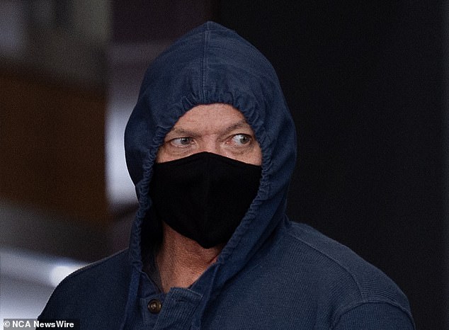 Truck driver Russell, who wore a mask and hoodie outside court, pleaded not guilty to all 80 charges