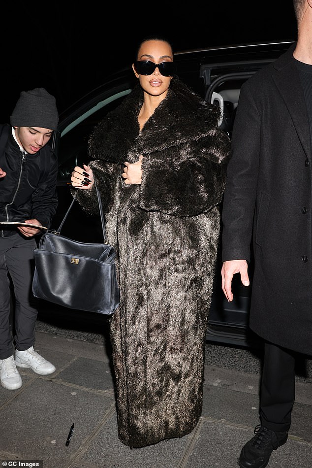 Kim tried to keep a low profile as she stepped out in an oversized jacket and dark-rimmed glasses