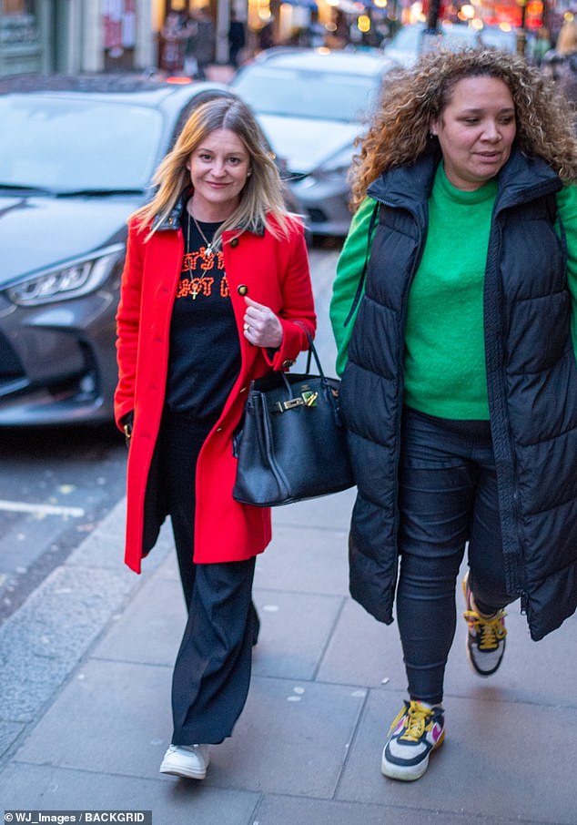 The 49-year-old actress, a household name during her heyday in the 1990s, greeted onlookers with a smile as she browsed a series of shops in Soho.