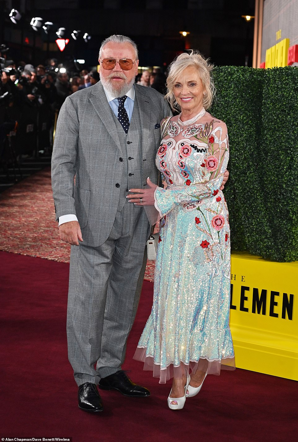 Ray Winstone looked dapper in a gray three-piece suit as he attended the premiere with his wife Elaine