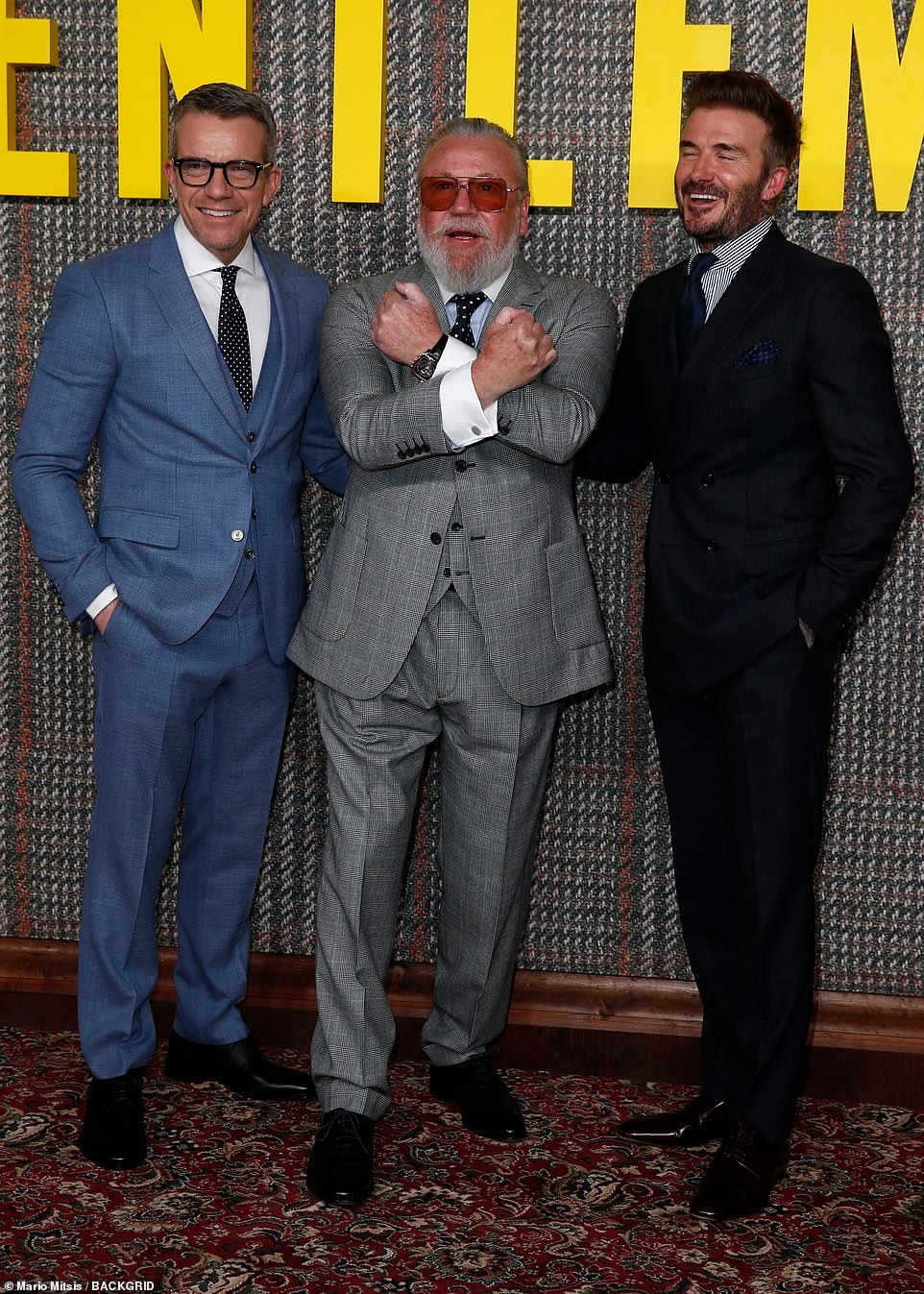 David looked cheerful as he posed alongside Max Beesley and Ray Winstone