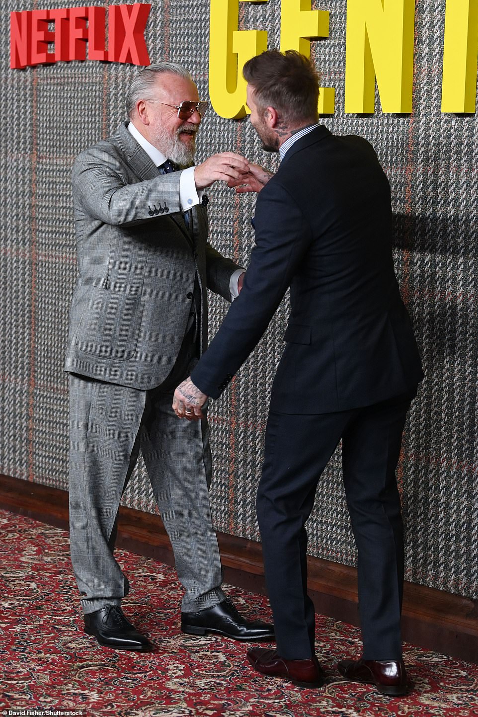 Ray gave David a hug as they greeted each other on the red carpet