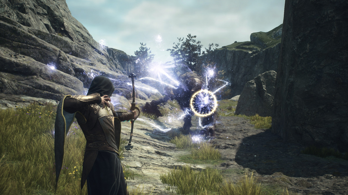 The Arisen uses the Magick Archer summoning to shoot spell arrows at enemies in Dragon's Dogma 2.