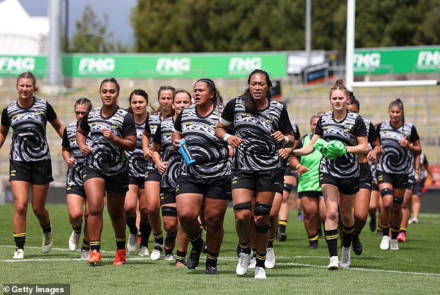Haka leader Leilani Perese of the rugby team supports the message in the haka (photo: Hurricanes players warm up for the match against Chiefs Manawa)