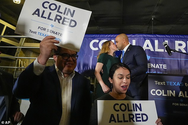 Representative Allred and his wife Alexandra Eber kiss as they celebrate his victory in the Democratic Senate primary in Dallas, Texas on Tuesday, March 5, 2024