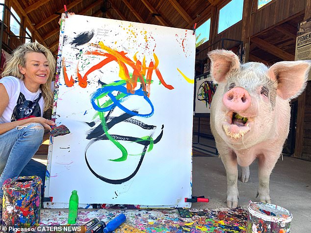 Joanne Lefson, 52, with a smiling Pigcasso.  Lefson said: “There is great sadness that such an inspiring figure for animal welfare has passed away, but we also celebrate a life well lived and the profound difference she made.”