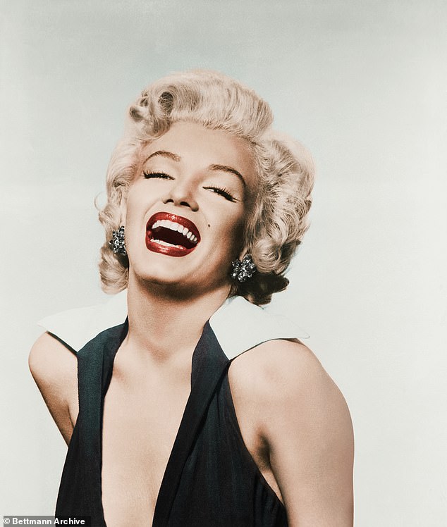 Jasmine styles her hair in big, blonde waves just like the American model and even wears a matching iconic red lip.  In the photo: the real Marilyn Monroe