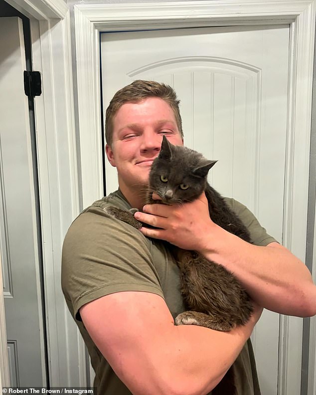 Garrison had adopted a third cat just five days before he killed himself, and last week he showed off his new pet on Instagram