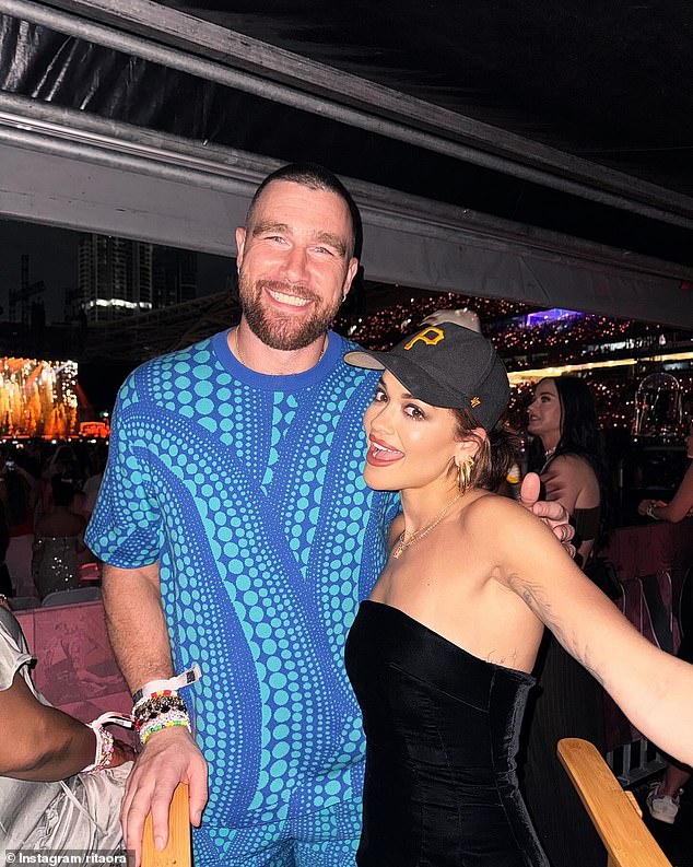 TikTok users were quick to praise Kelce for the sweet act, with one commenting: 'So nice of him to always join in with the Swifties' (Kelce is pictured with Rita Ora on the show)