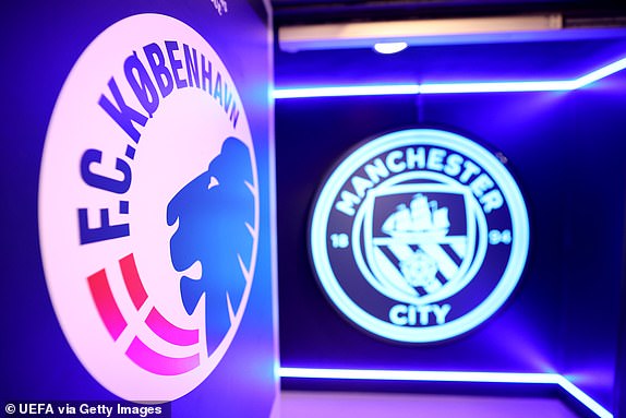 MANCHESTER, ENGLAND - MARCH 06: A detailed image of the FC Copenhagen crest is seen next to the Manchester City crest ahead of the 2023/24 UEFA Champions League Round of 16 second leg match between Manchester City and FC Copenhagen at the Etihad Stadium on March 06, 2024 in Manchester, England.  (Photo by Jan Kruger - UEFA/UEFA via Getty Images)