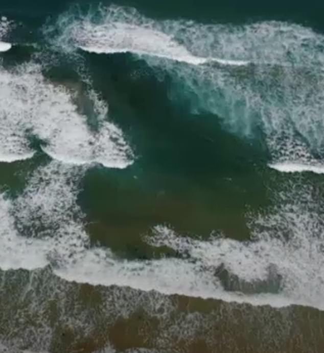 Cracks are the biggest hazard on Australia's beaches and can be difficult to spot.  However, the main signs of a crack are fewer breaking waves, gaps between the waves and deep dark water (photo)