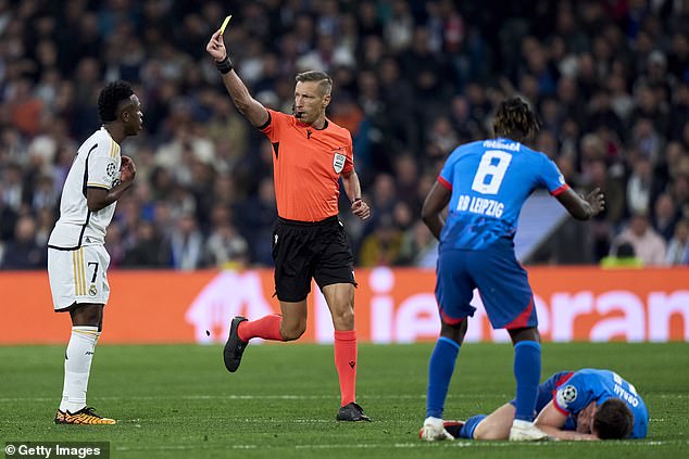 Vinicius was lucky to escape a red card after pushing Willi Orban to the ground