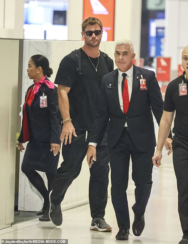 Wearing a five o'clock shadow, he accessorized his look with a gold pendant necklace, a stack of bangles and his wedding ring from his wife Elsa Pataky.