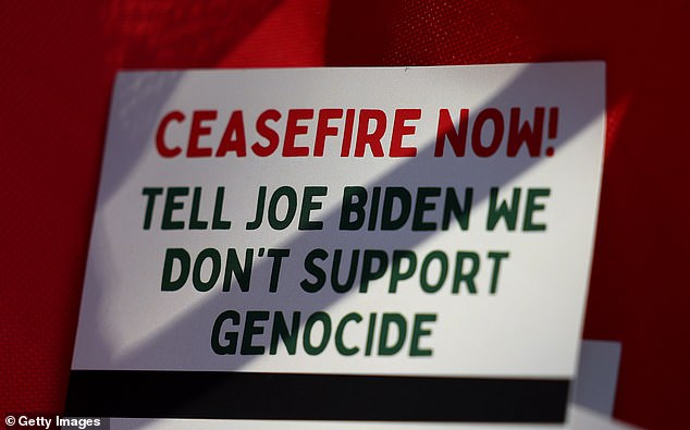A flyer calling for a ceasefire in Gaza is seen outside a polling station at Maples Elementary School on February 27, 2024 in Dearborn, Michigan.