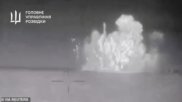 Handout footage shows an explosion on what Ukrainian military intelligence believes is the Russian Black Sea Fleet patrol ship Sergey Kotov, which was damaged by Ukrainian naval drones, at sea, at a location off the coast of Crimea, in this stationary image obtained from a video released on March 5, 2024
