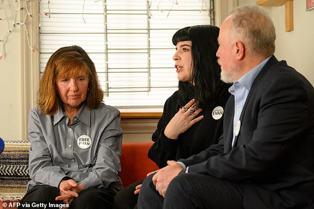 Ella Milman (left) and Mikhail Gershkovich (right), mother and father of incarcerated journalist Evan Gershkovic, will attend the State of the Union address;  they are seen above with their daughter Danielle